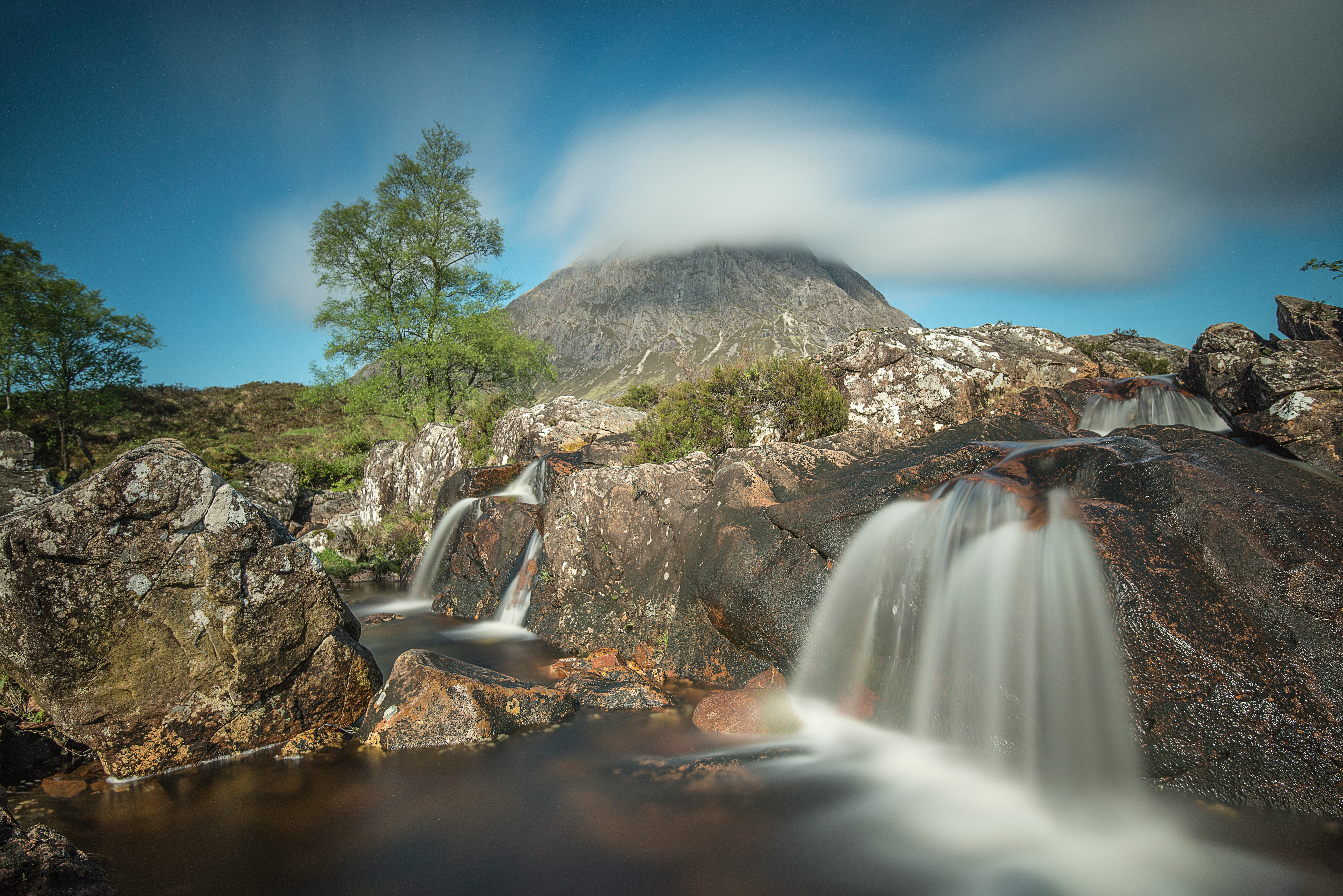 time-lapse photogrpahy of multi-step waterfalls duing daytime